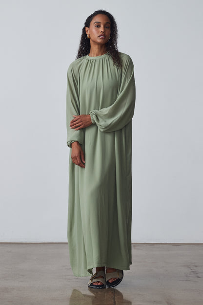 The Sheer High-Neck Dress