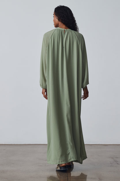 The Sheer High-Neck Dress