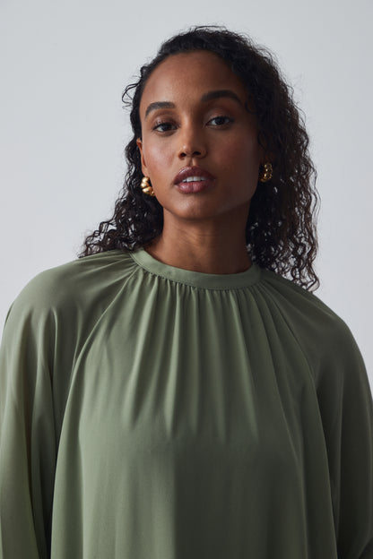 The Sheer High-Neck Dress