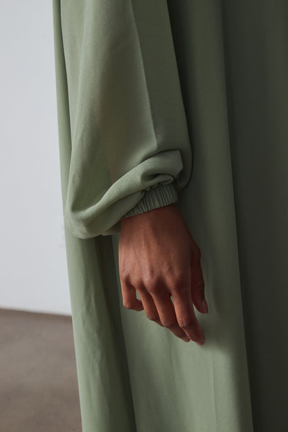 The Sheer High-Neck Dress